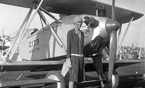 Amelia Earhart with a CIT-9 Merrill Biplane in 1928.